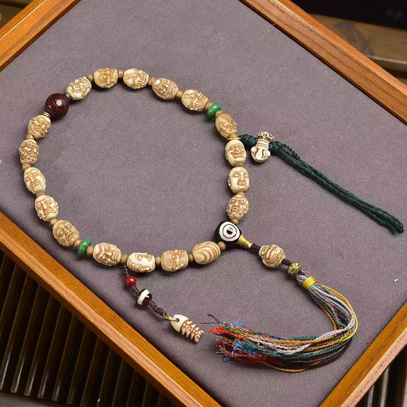 - hand-carved bone carving of the Eighteen Arhats, Tibetan-style cultural accessory with phoenix-eye bodhi, agate, a