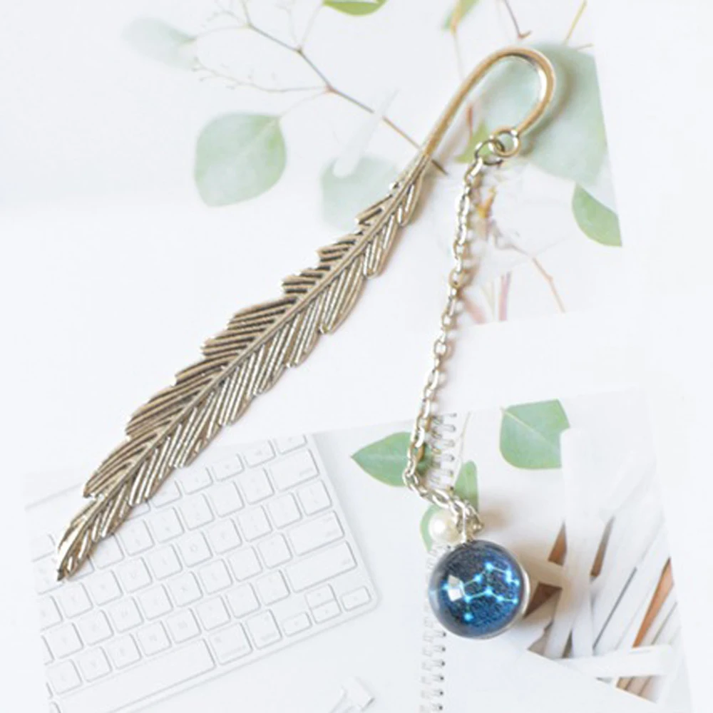 Student Feather Bookmark Metal Book mark Creative Luminous 12 Constellation Bookmark Pendant Bookmark Noctilucent Bookmark