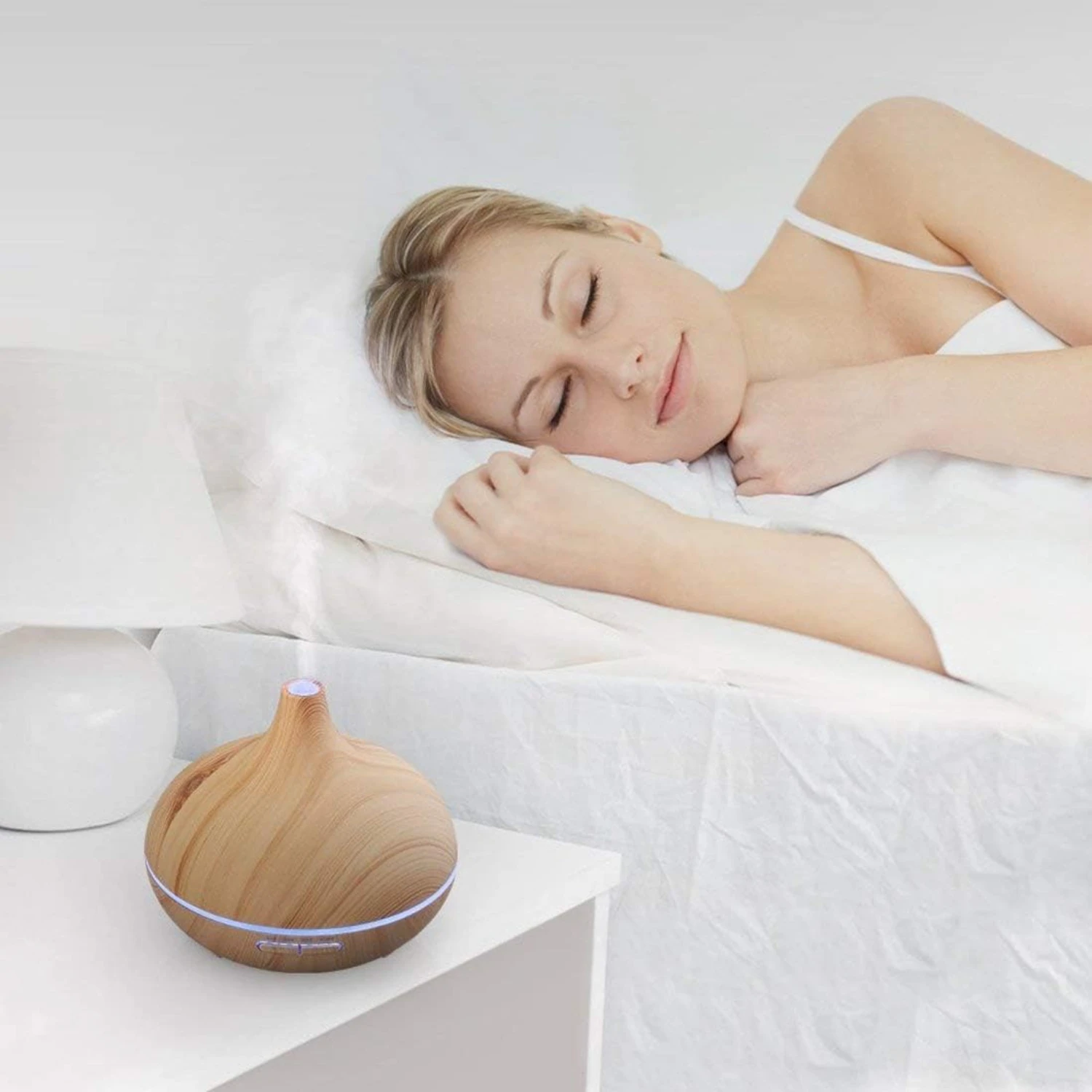 Experience ultimate relaxation and aromatherapy with the stylish 500ml brown essential oil diffuser. Transform your living space