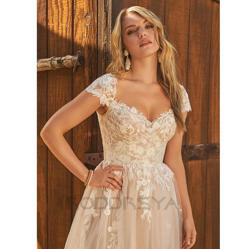 Roddrsya elegante boho vestido de casamento para mulher 2023 querida apliques rendas boné manga plissada sem costas com botão feito sob encomenda