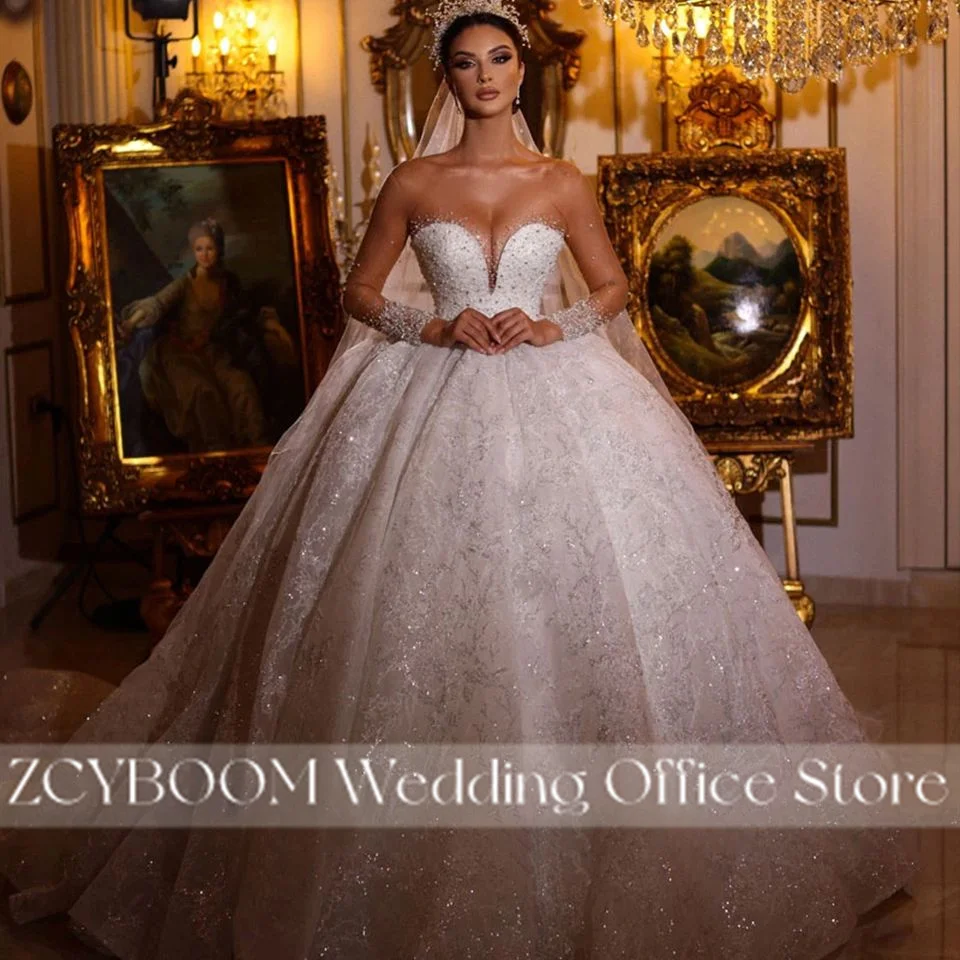 Squisito abito da ballo scintillante perline abiti da sposa con collo trasparente 2025 principessa illusione maniche lunghe abiti da sposa abiti da noiva