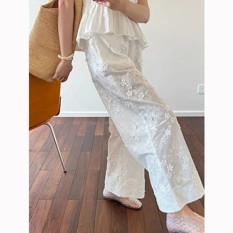 Nuovi pantaloni estivi a gamba larga moda pizzo bianco scava fuori ricamo floreale pantaloni dritti in vita elastica tinta unita da donna