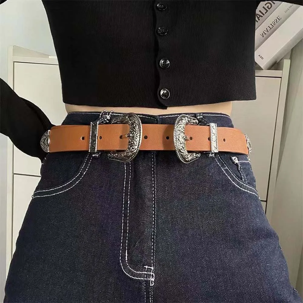 เข็มขัดคาดเอวแฟชั่นเท่ห์แบบหัวเข็มขัดคู่ สไตล์อเมริกัน หัวเข็มขัดแกะสลักปรับได้ เข็มขัดหนัง PU สีดำแบบวินเทจสำหรับผู้ชาย