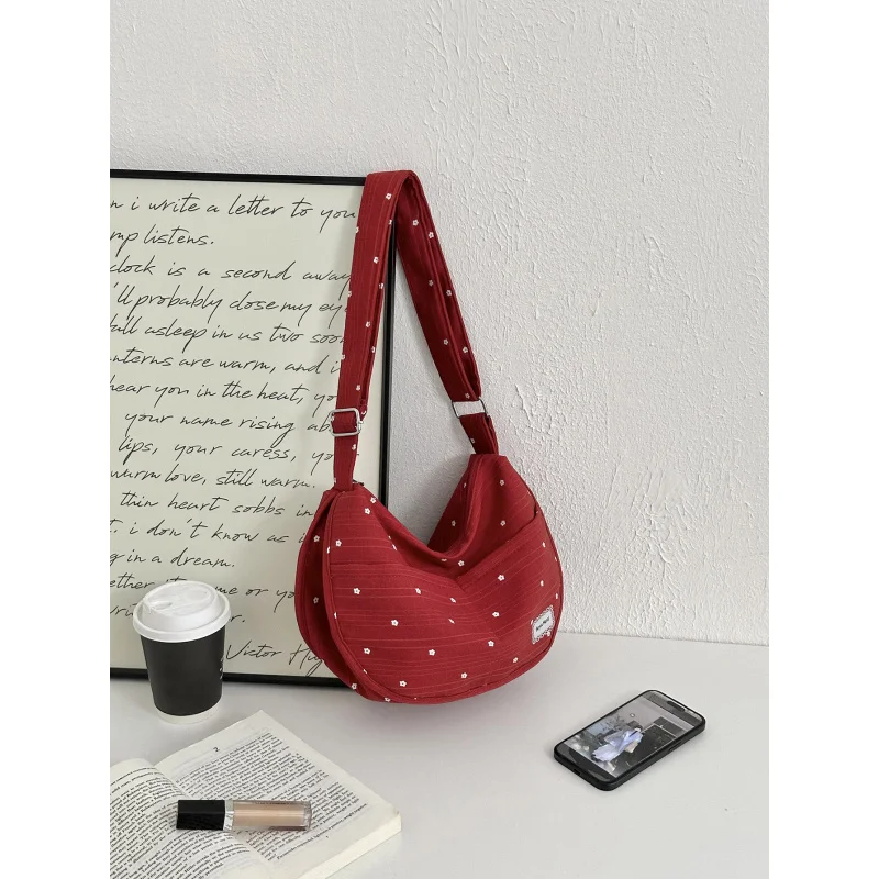 

Korean-style niche polka dot canvas bag2026New large-capacity shoulder bag with a high-end feel, suitable for commuting, crossbo