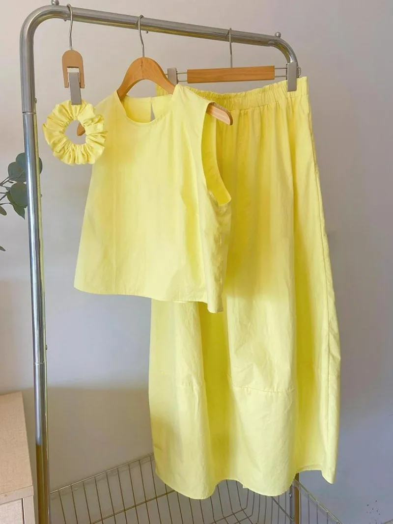 202-neues Sommer-Damen-Set, modisch, stilvoll, ärmellos, gelbes rückenfreies Hemd, hohe Taille, schlankmachender A-Linien-Langrock