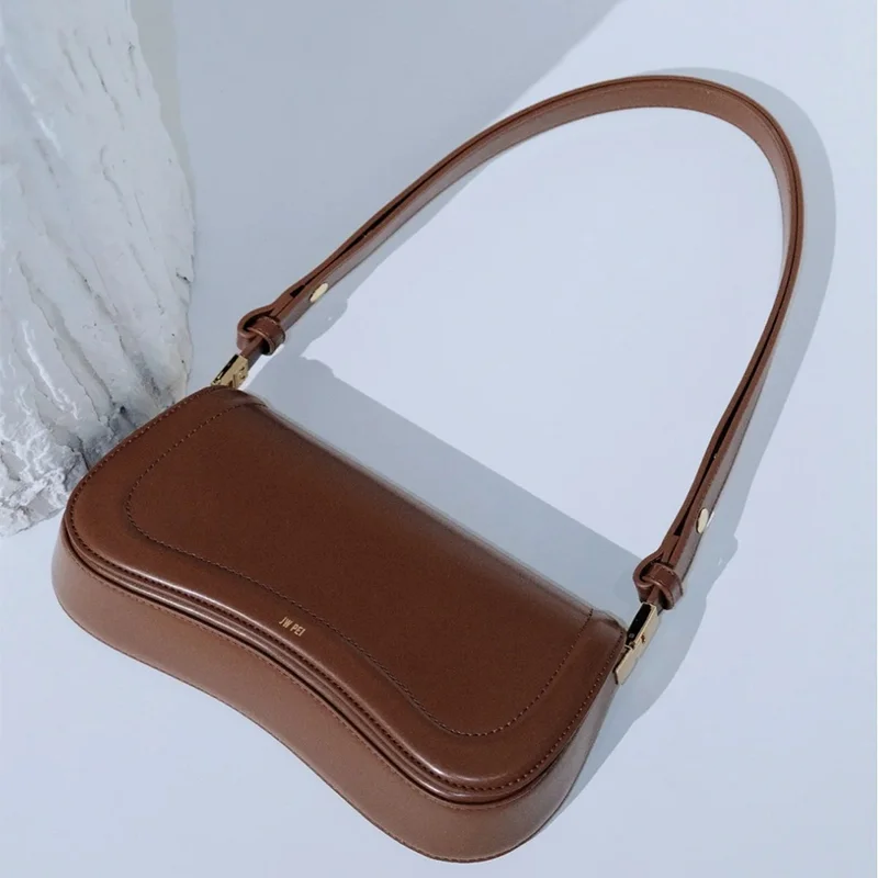 

Pudding Bag Niche Hand-held Genuine Leather Women's Bag Simple Texture Single Shoulder Armpit Fashionable Crossbody Women's Bag