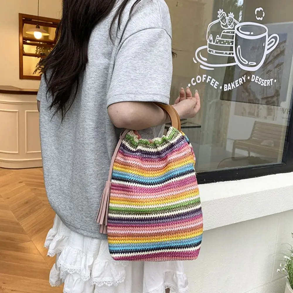 

Simple Bohemian Style Rainbow Woven Handbag with Tassel Hollow Out Woven Crochet Bag Beach Sweet Underarm Bag Summer