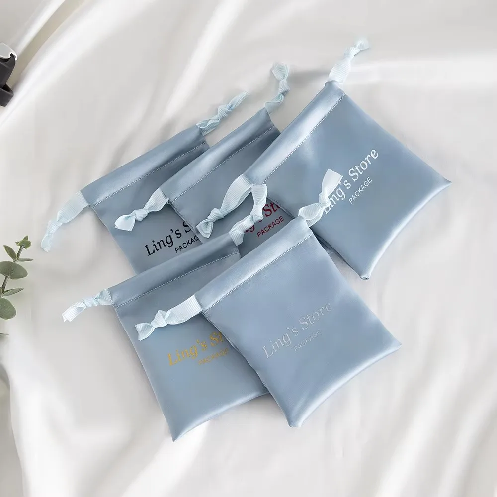 

100pcs Luxury Customized Logo Ocean Blue Jewelry Gift Bags Drawstring Candy Silk Satin Dustproof Pouches Costume High Heel Shoes