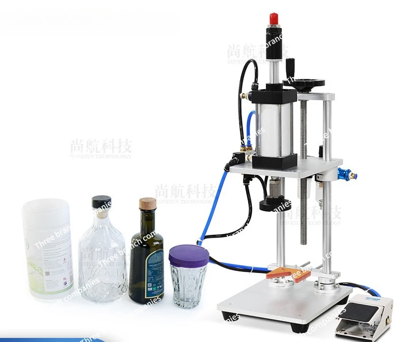 

Pneumatic desktop perfume glass plastic bottle cap sealing machine