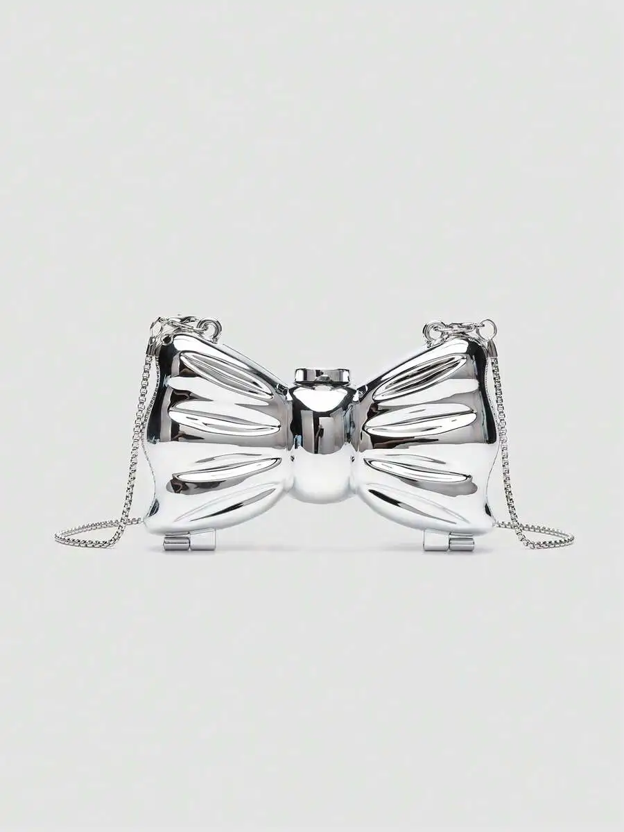 

Mini Acrylic Metallic Silver Bow Clutch Bag with Chain Strap