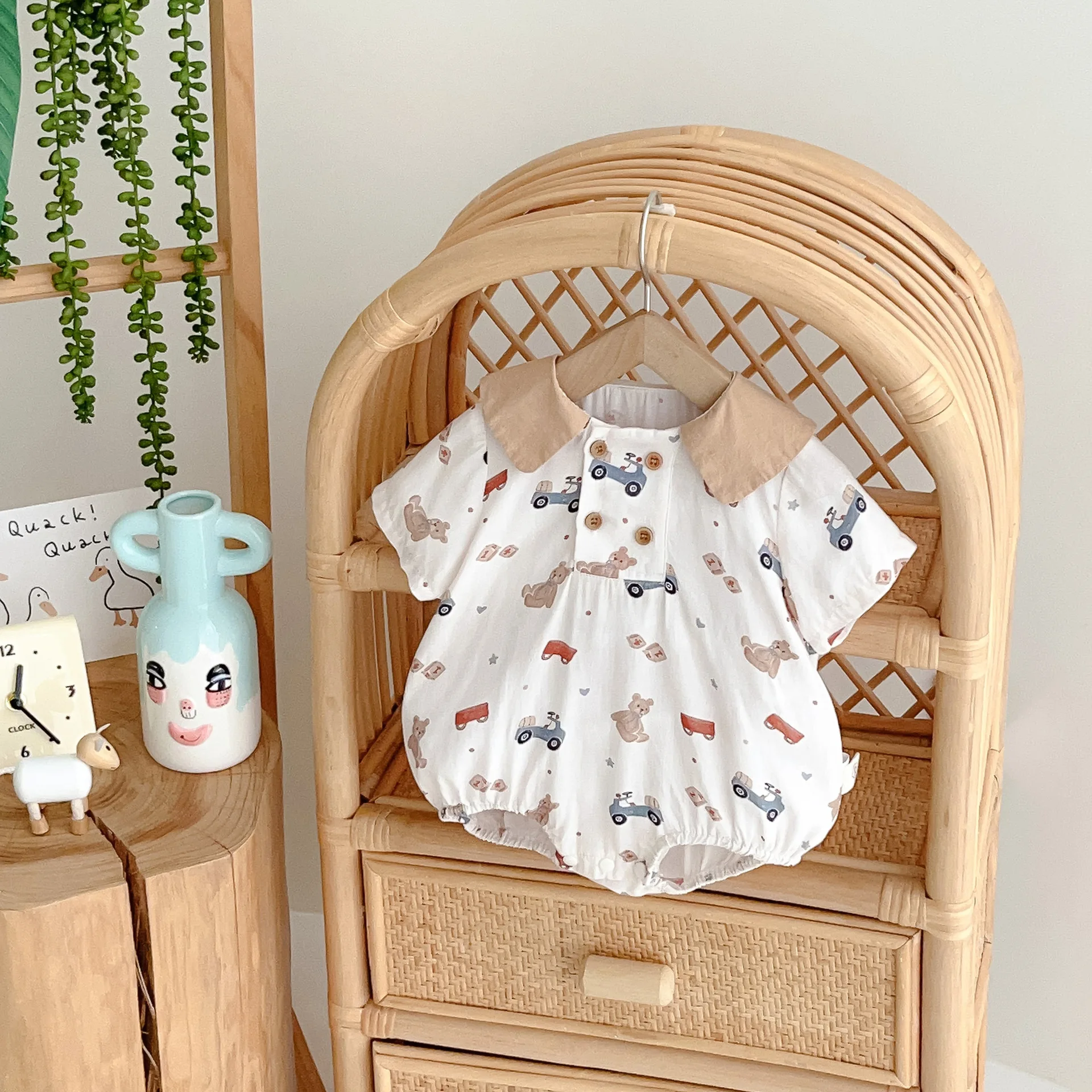 

2025 Summer Nordic Style Cartoon Printed Thin Short Sleeved Khaki Cotton A-level Baby Boy Bag Fart Clothes Outdoor Wear