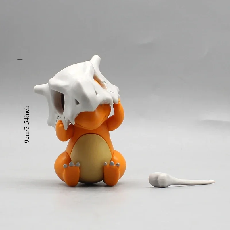 

9cm Anime Cartoon Pikachus Charmander Wear Cubone Helmet Kawaii Figure Model Statue Desktop Decoration Ornament Toy Gift