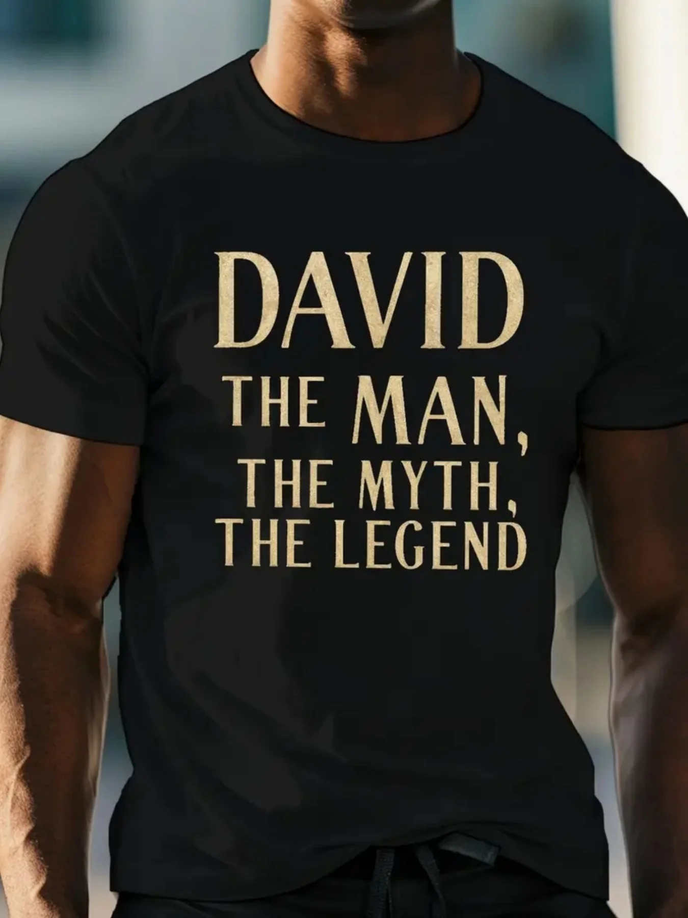 Men's T-Shirt Features a Striking Gold Print of 