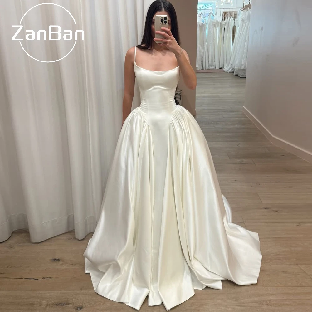 ZanBan Modernes A-Linien Brautkleid nach Maß mit Spaghettiträgern 2026 – Ärmelloses Brautkleid mit Falten und Schleppe
