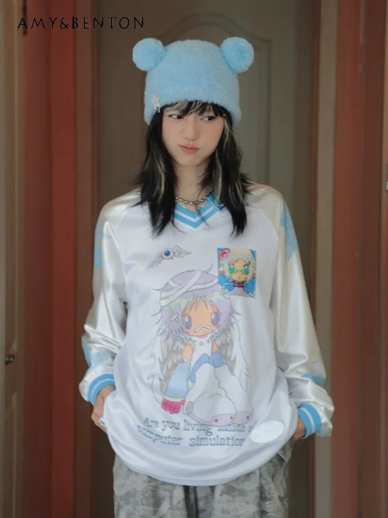 

Japanese Autumn and Winter Original Niche Sports Blue and White Cartoon Printing Shoulder Plugs Long Sleeves T-shirt Top Women