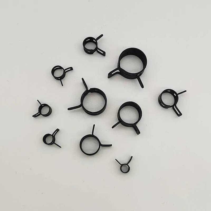 Abrazadera de banda de 100 piezas negra # 65 Acero al manganeso 7mm-34mm diámetro interior manguera resorte tipo banda acción combustible línea tubo Clip abrazadera