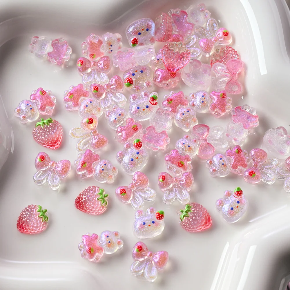 50個/袋 カワイイ シャイニー ピンク オーロラ 漫画風 いちご うさぎ ネイルアート チャーム 3D ミックス キュート リボン ネイルデコレーション マニキュア用品