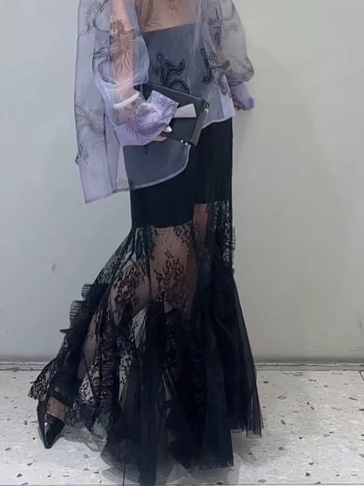 

Fashion embroidery mesh stitching wooden ear perspective Joker skirt summer new women's high waist slim temperament hip skirt.