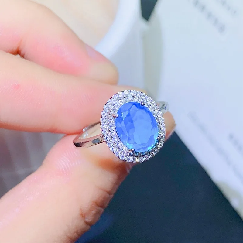 

Женское кольцо из серебра 925 пробы с натуральным голубым опалом, 9 х7 мм