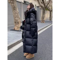 Chaqueta acolchada de plumón para invierno, nuevo estilo, versión coreana por encima de la rodilla, patrón largo, sensación de avance lento, moda femenina cálida