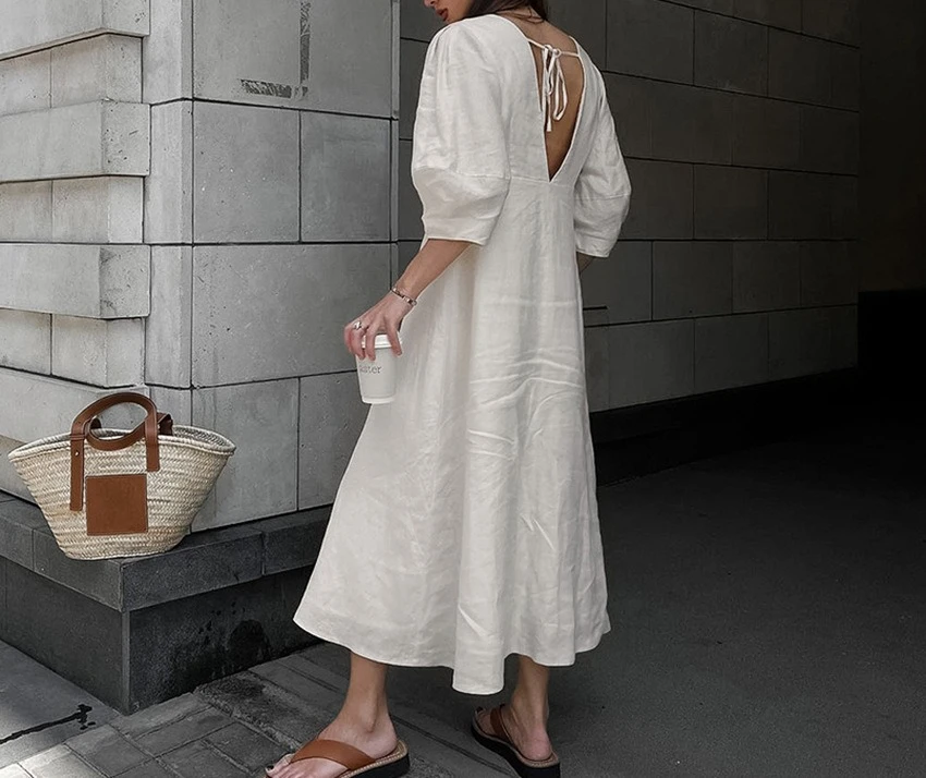 2025 Franse stijl licht volwassen beige linnen bubble mouw jurk dames zomer backless losse v-hals shirtjurk lange jurk