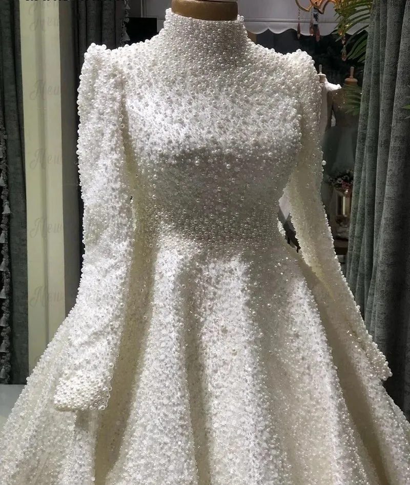 

Luxury Dubai Wedding Dresses 2026 High Neck Beaded Pearls Sequins Long Sleeves Bridal Gowns Bride Dress Vestidos De Noiva
