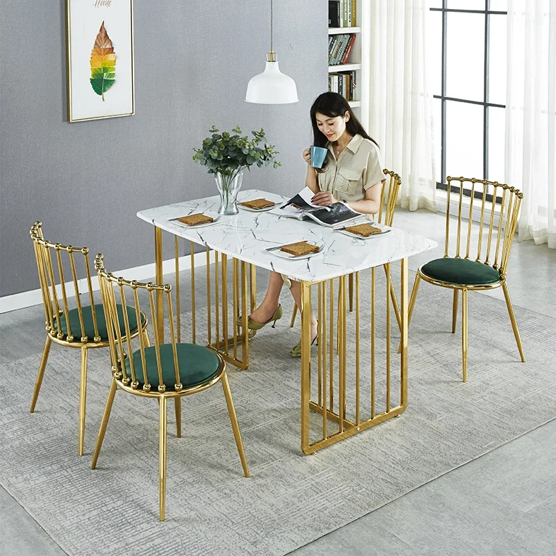 

High-end restaurant marble dining table and chair combination Nordic simple stainless steel gold-plated luxury wrought iron