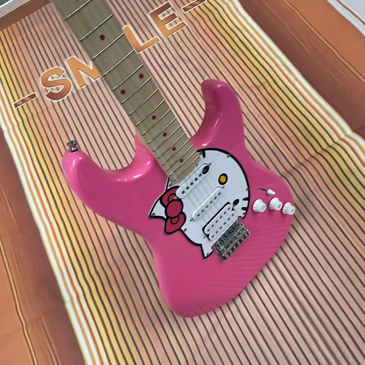 KT cat style 6-string split electric guitar, pink body, high gloss, maple fingerboard, maple track, painted protective plate, si