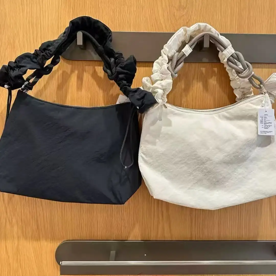 Lemon yoga bag multi-functional and fashion packet sports and casual 6.5L and 16L capacities crossbody bag pleated shoulder bag