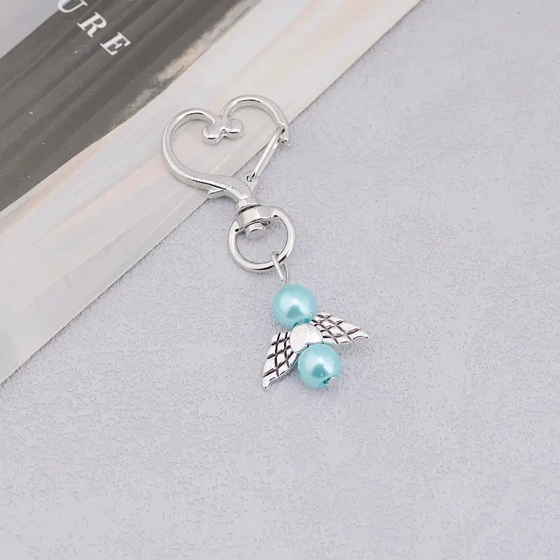 Weiße, Rosa und Blaue Herz-Schlüsselanhänger, 10 Stück, 6 cm, Legierung, Engelsflügel, Schutzengel-Schlüsselringe für Brautparty-Geschenke – Detail 5