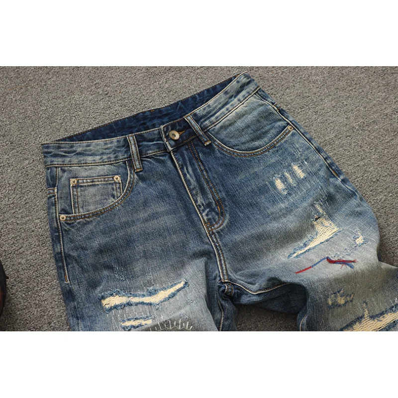 

Trendy American retro ripped patch loose straight leg jeans for men, fashionable streetwear, cool and nostalgic pants