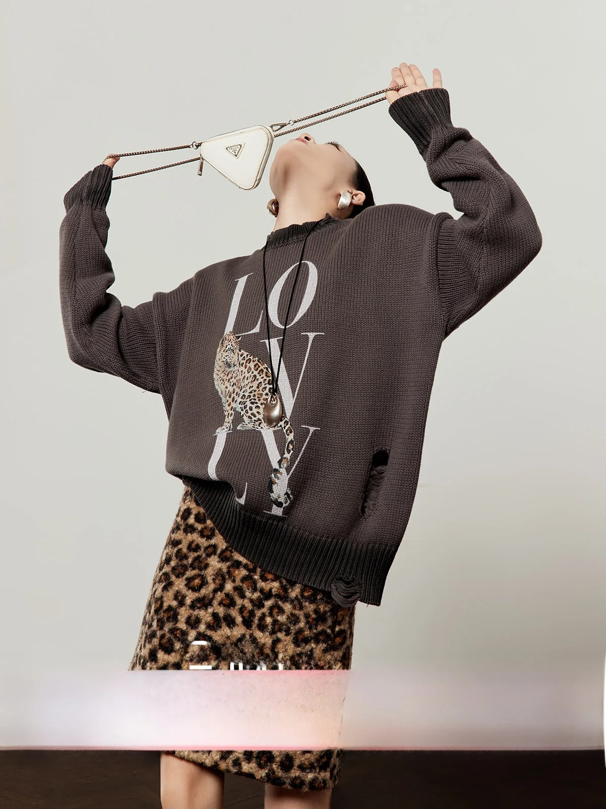 

ay Knitted Loose Hole Winter Sweater for Women by Zhou Li Wu Leopard Tail Word Wrap Casual Sle Long Sve Top