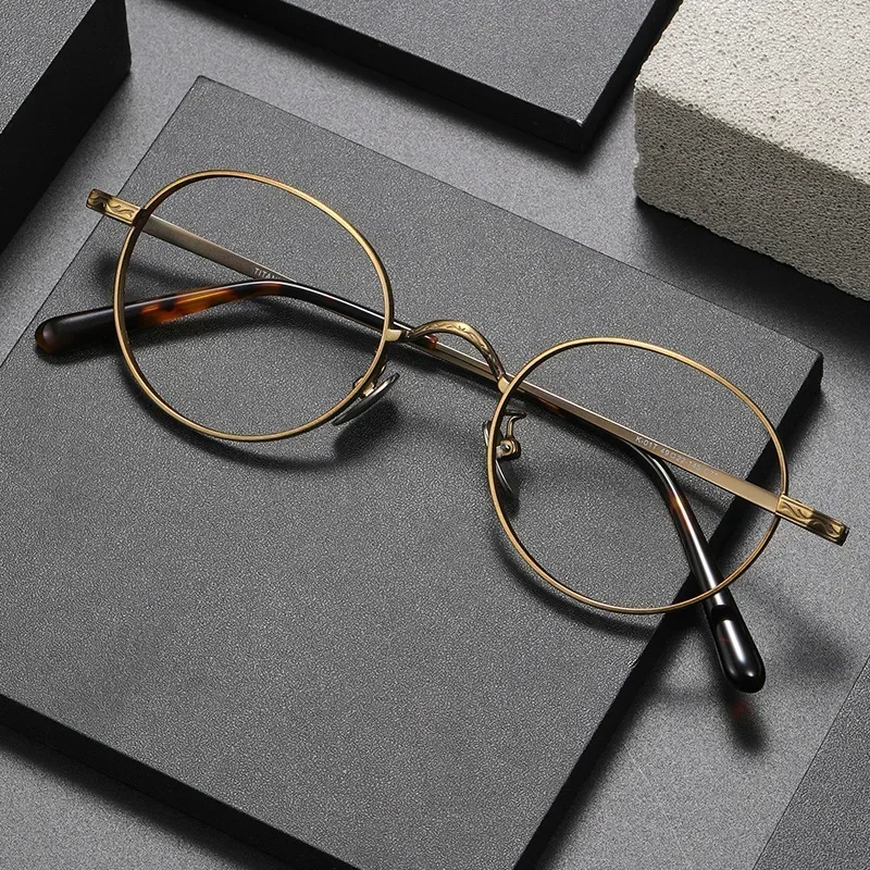 Occhiali classici rotondi in titanio retrò Montatura per occhiali da vista di lusso alla moda per uomo Donna Occhiali da vista con montatura per miopia ovale vintage