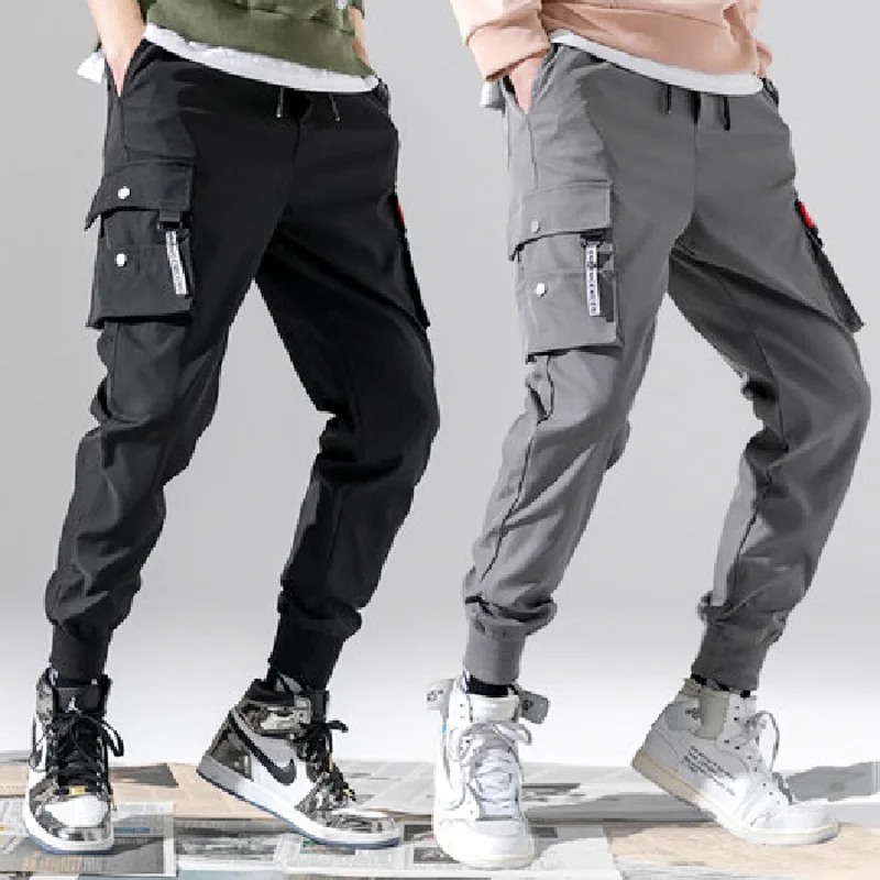Pantalones de otoño para hombre, pantalones para correr Harem de Hip Hop, novedad de 2025, pantalones para hombre, pantalones Cargo lisos con múltiples bolsillos, pantalones de chándal ajustados