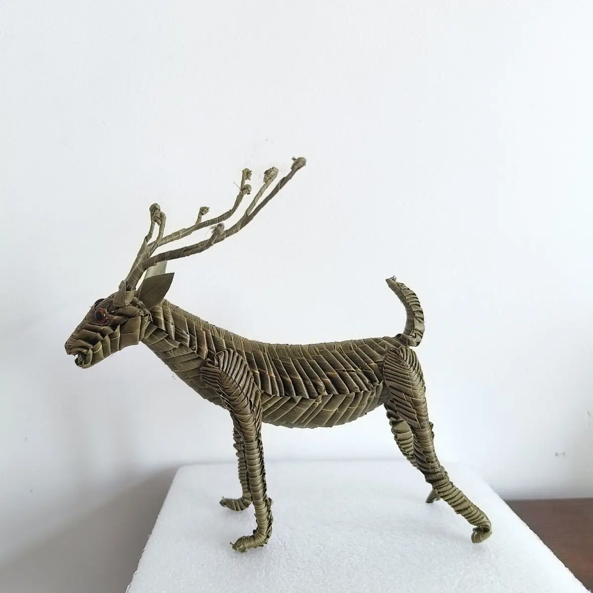 Palm weaving and grass weaving as intangible cultural heritage of the spotted deer are exquisite decorations made purely by hand