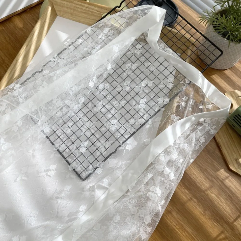 Encaje transparente ​ ​   Falda con cordones Falda transparente ​ ​ ​ ​ Lazos ajustables ​ ​ ​ ​ Media falda de encaje ​ ​ ​ ​ Diseño Boho ​ ​ ​ ​ Lentejuelas brillantes ​ ​