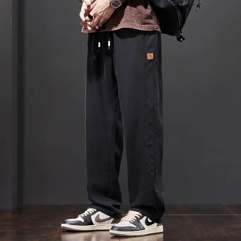 Trendy casual pants for men in autumn and winter,2025 new sports long styles, loose fitting sports workwear pants for men