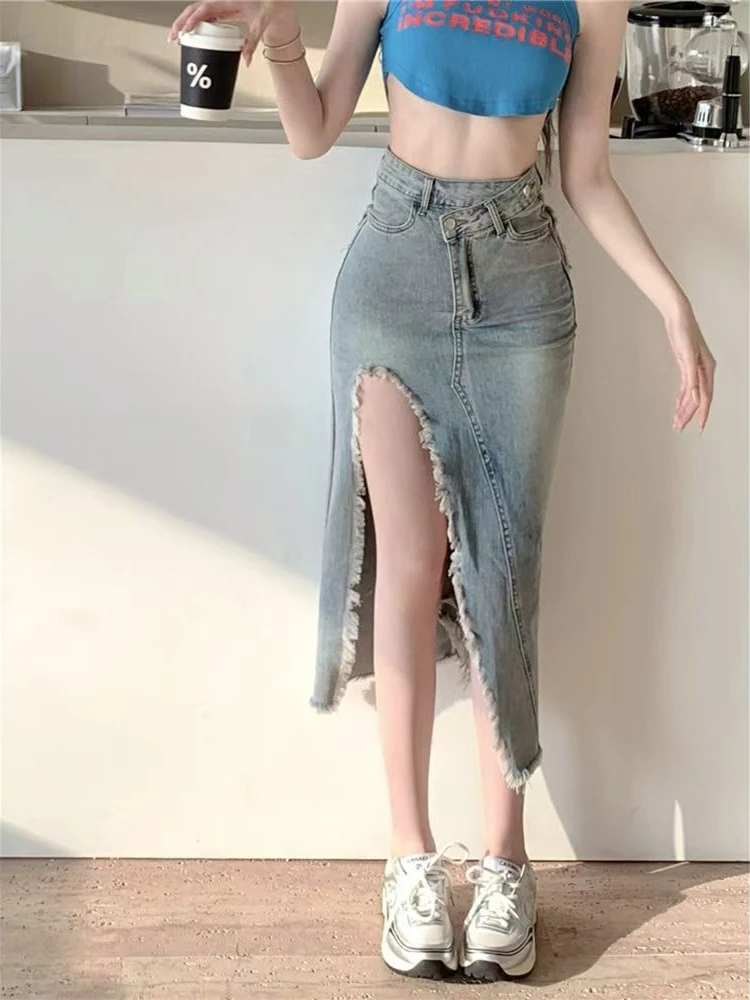 

​ Женская летняя джинсовая юбка-миди с завышенной талией, облегающая, винтажная, с асимметричным разрезом и рваными краями, нишевая модель ​