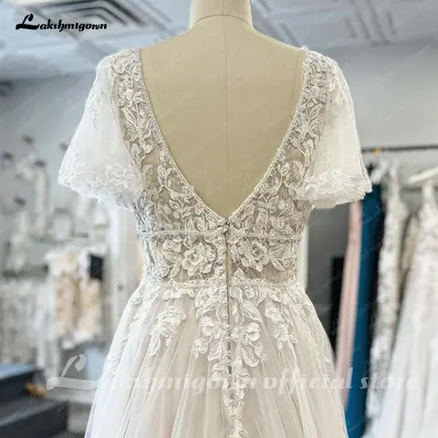 Lakshmigown Kant V-hals Boho Trouwjurk met Mouwen vestidos de fiesta Een Lijn Tule Strand Bruidsjurken Aangepaste Hochzeit
