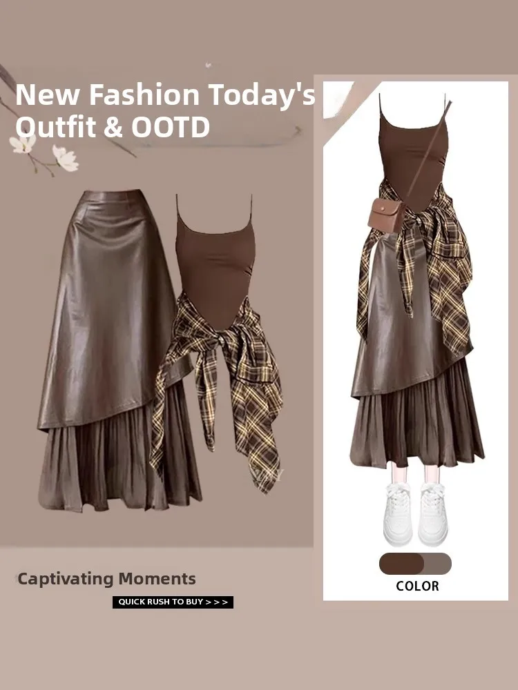 

Модный американский клетчатый комплект: юбка с завышенной талией и асимметричным подолом, свободного кроя, из полиэстера. Новинка весны.