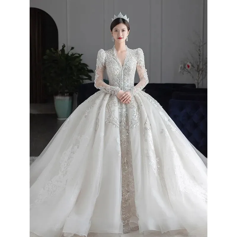 

Customized White 2026 Long Sleeved Winter Wedding Dress New V Neck Luxury Beading Princes Wedding Gown Vestido De Noiva