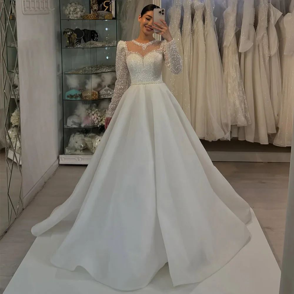 Customized Sparkling Princess Wedding Dresses Round Neck Long Sleeves Beading Sequined A Line Sweep Train Arabian Bridal Gowns