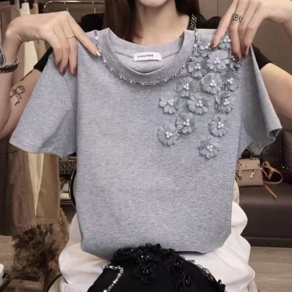 Design sense three-dimensional flower bead short-sleeved T-shirt women's 2026 summer Korean loose temperament age-reducing top