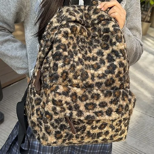 Y2K วินเทจตุ๊กตาเสือดาวพิมพ์กระเป๋าเป้สะพายหลังสำหรับสาวความจุขนาดใหญ่นักเรียนวิทยาลัยกระเป๋านักเรียนลำลองแบบพกพาสุภาพสตรีกระเป๋าสะพาย