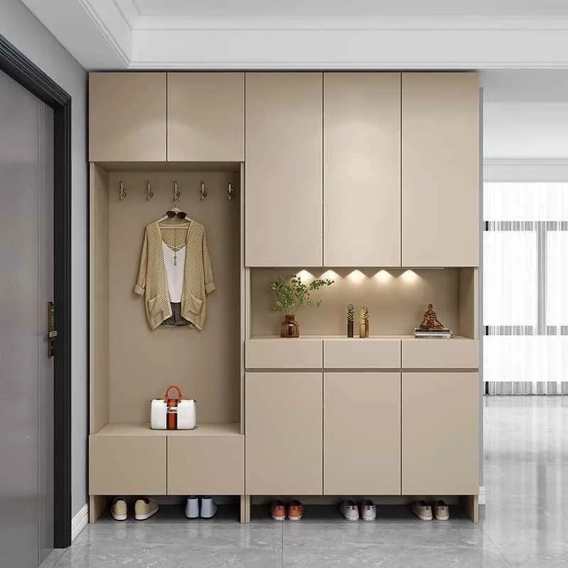 integrated stool against the wall at the entrance of the home, coat cabinet can be seated into the entrance hall