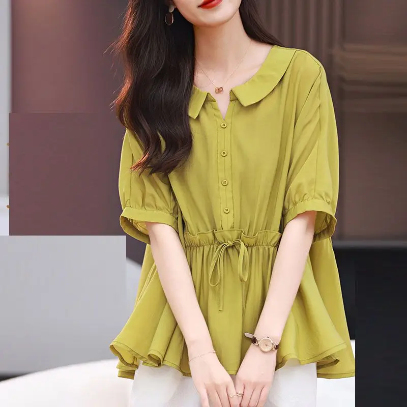 

2024 Summer Korean Doll Collar Blouse Loose Button Women's Clothing Solid Color Stylish Ruffles Spliced Commute Drawstring Shirt