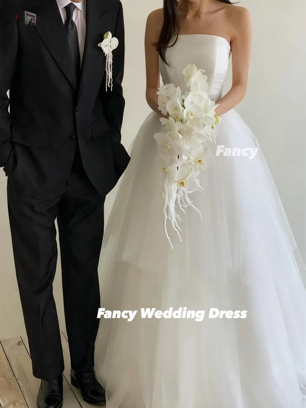 Fancy elegante strapless Korea A-lijn trouwjurken schouder Cape fotoshoot jurk op maat gemaakte gedrapeerde tule bruidsjurk