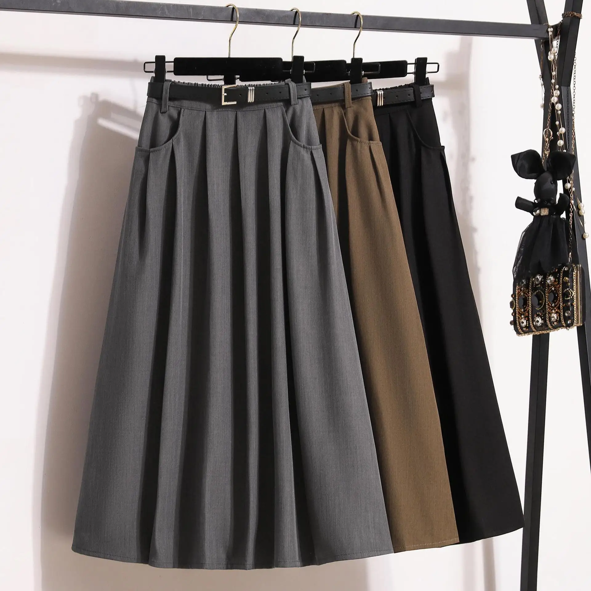 

2024 Autumn Temperament Long Skirt High Waist Pleated A-line Solid Color Versatile Umbrella Skirt Slimming Large Hem Suit Skirt