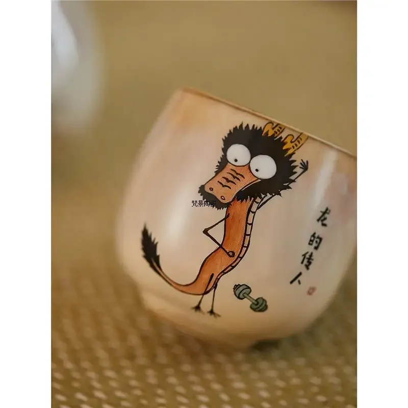 Outline the original Guochao full hand-painted fun zodiac dragon ceramic teacup, kiln change retro large tea master cup