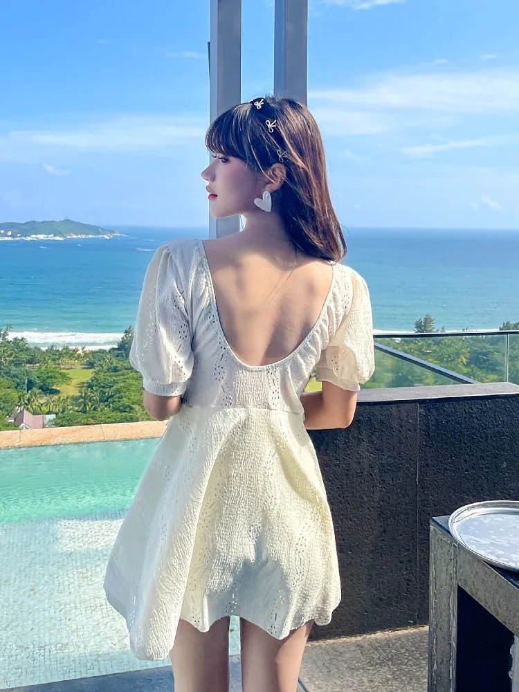 Traje de baño sencillo y dulce para mujer, ropa de playa unicolor, nuevo diseño universitario, vendaje de manga corta, Mini cintura alta, Ins coreanos